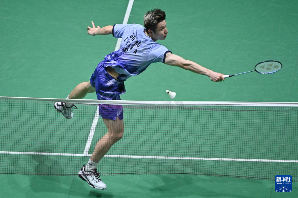 包含羽毛球男单决赛上演精彩一幕的词条